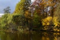 Autumn park lake with bright fall season trees Royalty Free Stock Photo