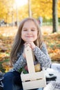 Autumn park: portrait beautiful little girl Royalty Free Stock Photo