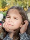 Autumn park: portrait beautiful little girl Royalty Free Stock Photo