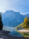 Autumn peaceful alpine lake Braies or Pragser Wildsee. Dolomites Alps, Italy, Europe. People unrecognizuble Royalty Free Stock Photo