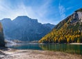 Autumn peaceful alpine lake Braies or Pragser Wildsee. Dolomites Alps, Italy, Europe. People unrecognizuble Royalty Free Stock Photo