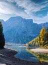 Autumn peaceful alpine lake Braies or Pragser Wildsee. Dolomites Alps, Italy, Europe. People unrecognizuble Royalty Free Stock Photo