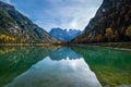 Autumn peaceful alpine lake Durrensee or Lago di Landro. Snow-capped Cristallo rocky mountain group behind, Dolomites, Italy,