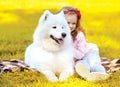 Autumn photo dog and child having fun Royalty Free Stock Photo