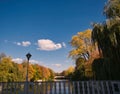 Autumn picture of a bridge at the Isar in Munich Royalty Free Stock Photo