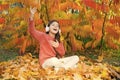 Autumn playlist concept. Enjoy music outdoors fall warm day. It is time to get in the mood with some great music. Kid Royalty Free Stock Photo