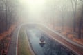 Autumn pond Cozy alley in a city foggy park in the fall. Gomel, Belarus Royalty Free Stock Photo