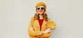 Autumn portrait of cheerful smiling woman with yellow maple leaves wearing french beret Royalty Free Stock Photo