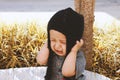 Unhappy 2-3 years old child crying in autumn garden Royalty Free Stock Photo