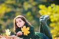 Autumn portrait of young teenage girl relax outdoor. Young pretty teen at park. Royalty Free Stock Photo