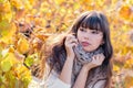 Autumn portrait of a young woman