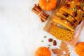 Autumn pumpkin bread above view over white marble with copy space Royalty Free Stock Photo