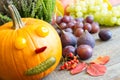 Autumn pumpkin fun background with colorful leaves and fruits and vegetables Royalty Free Stock Photo