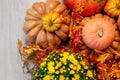 Autumn Pumpkin Thanksgiving Background - orange pumpkins, leaves and flowers Royalty Free Stock Photo