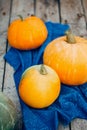 Autumn Pumpkin Thanksgiving Background - orange pumpkins over wooden table Royalty Free Stock Photo