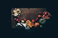 Autumn pumpkins, apples and pears on dark wooden background