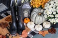 Autumn Rain Boots on Front Porch Welcome Mat