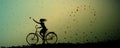 Autumn rain, girl riding on the bicycle and autumn leaves swirling and rain started, silhouette,