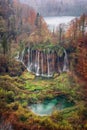 Autumn rainy landscape of waterfall in national park Plitvice Lakes, Croatia Royalty Free Stock Photo