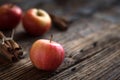 Autumn red apples with cinnamon sticks Royalty Free Stock Photo