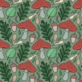 Autumn repeating background. Fall pattern with oak leaves and red mushrooms Royalty Free Stock Photo