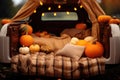 Autumn retro truck with pumpkins, plaid and pillows