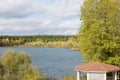 Autumn river forest landscape with pergola and yellow trees Royalty Free Stock Photo