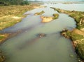 Grassy sandbank and stagnant water