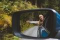 Autumn road trip woman traveling by rental car adventure lifestyle vacations vibes outdoor in Norway Royalty Free Stock Photo