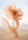 Autumn romance, vintage flower made of silk fabric develops in the wind, muted beige tones on a white background