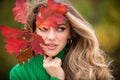 Autumn romance woman with leaves. Female model on foliage day. Dream and lifestyle. Beauty outdoor portrait. Carefree