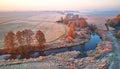 Autumn rural landscape. Frost on grass. River, field, meadow, fall color trees. Sunrise morning aerial panorama Royalty Free Stock Photo