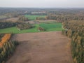 Autumn, rural landscape, plowed field and forests, drone photo