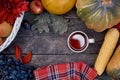 Autumn rustic still life: fruits, vegetables and cup of tea: pumpkin, pears, apple, melon, grape and corn. Thanksgiving Royalty Free Stock Photo