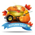 Autumn sale, round discount clickable web banner with ribbon for your website or business with garden wheelbarrow with a harvest