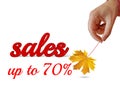 Autumn sale sales 70 70% hand gives yellow leaf white background space for your text