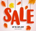 Autumn sale vector banner. Sale text in red color hanging with autumn leaves