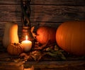 Autumn scene harvest pumpkins butternut squash on a wooden table with leaves