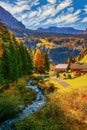 Autumn scenery of Dolomite Alps. Alpine village Santa Cristina Val Gardena, Italy