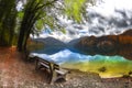 Autumn scenery with park around Alpsee lake and dock for tourist boats, Schwangau, Bavaria, Germany.