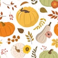 Autumn seamless pattern with colorful pumpkins, flowers, forest leaves, and berries Royalty Free Stock Photo