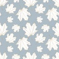 Autumn seamless pattern with golden maple leaves on a gray-blue background. Royalty Free Stock Photo