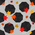 Autumn seamless pattern with rain umbrellas and leaves