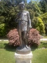 Autumn season represented by statue. Garden of the crystal palace in Porto.