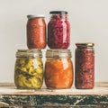 Autumn seasonal pickled or fermented vegetables in jars, square crop Royalty Free Stock Photo