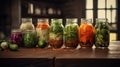 Autumn seasonal pickled or fermented vegetables in jars placed in row over vintage kitchen drawer, white wall background Royalty Free Stock Photo