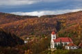 Autumn at Sklene Teplice with church at Stiavnicke vrchy mountains Royalty Free Stock Photo