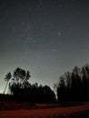 Orion stars and pleiades rising night sky observing in Latvia