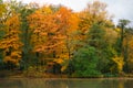 Autumn Solacz Park with Yellow Trees, Leaves and Pond. Poland, Poznan