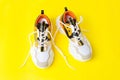 Autumn sports shoes on a yellow background